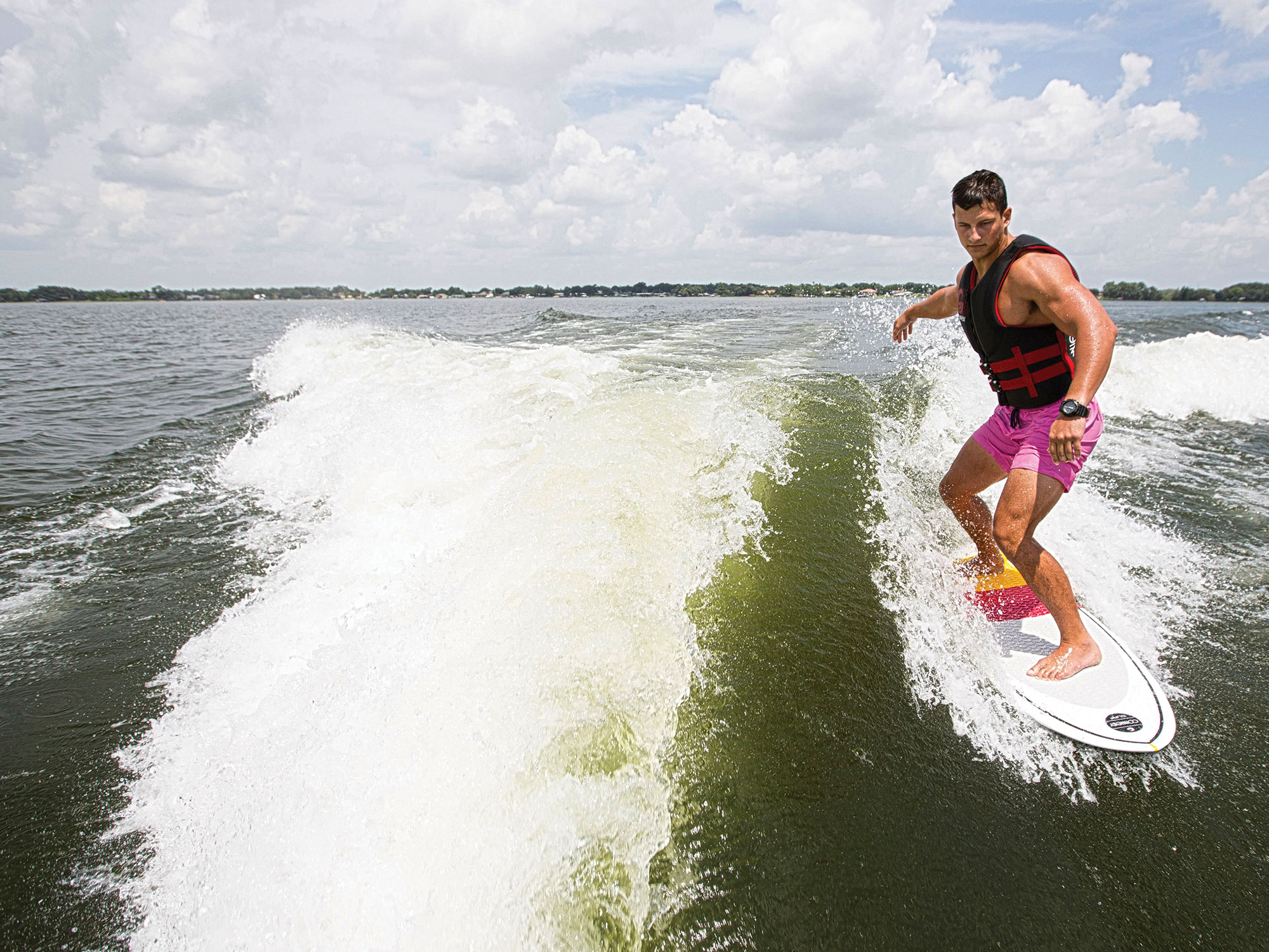 Wakesurfing behind a boat