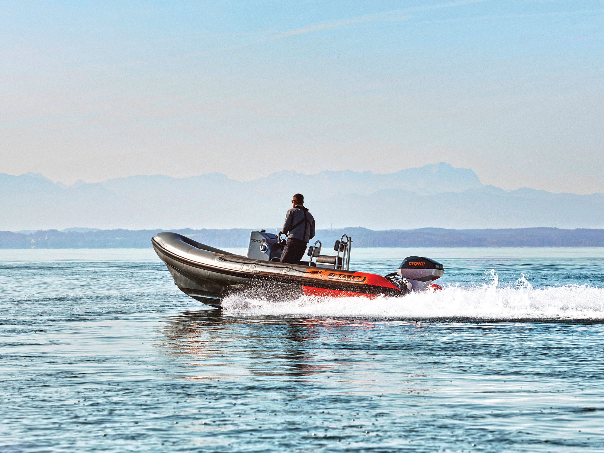 Boater driving electric boat