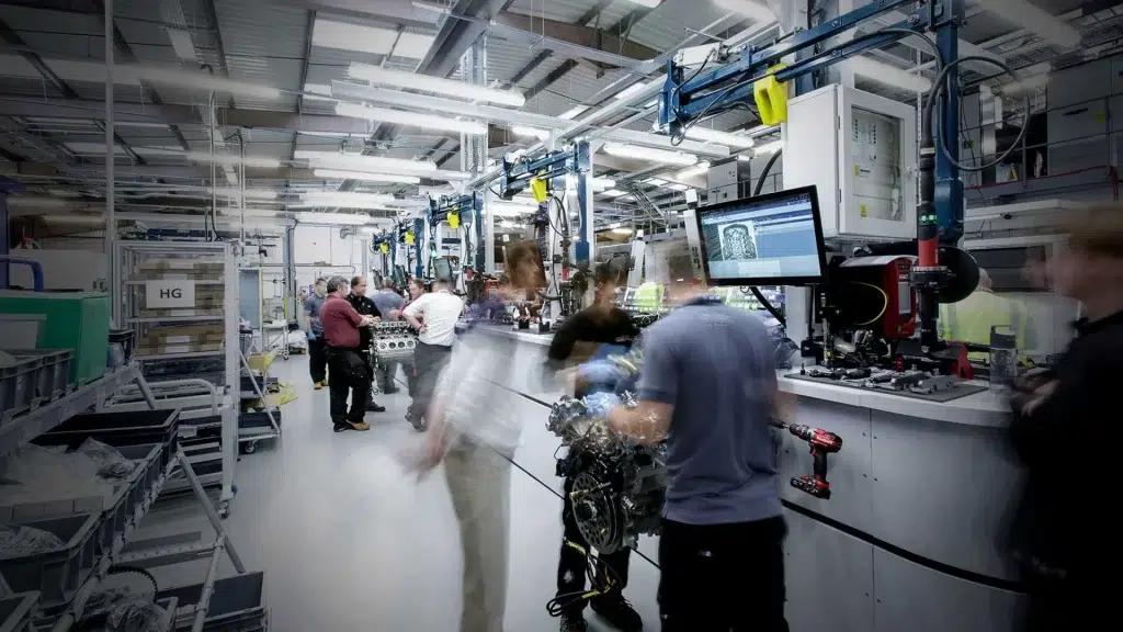 A time lapse image capture of the COX marine diesel outboard team working in their shop